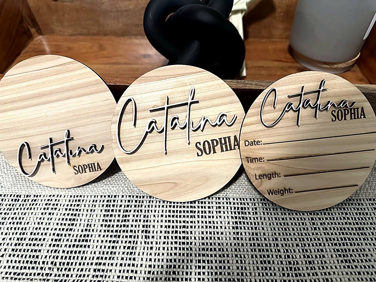 Personalized wooden monthly milestone discs for Catalina Sophia