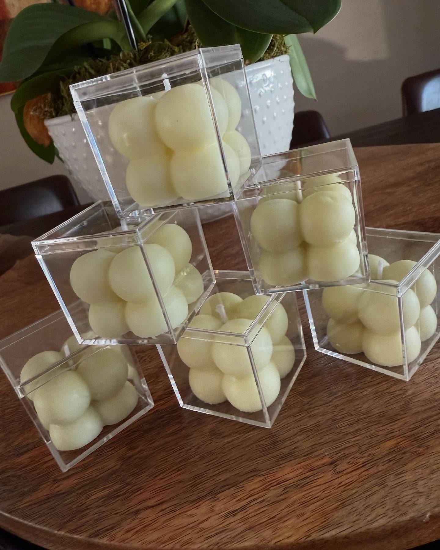 Handmade candles in clear boxes