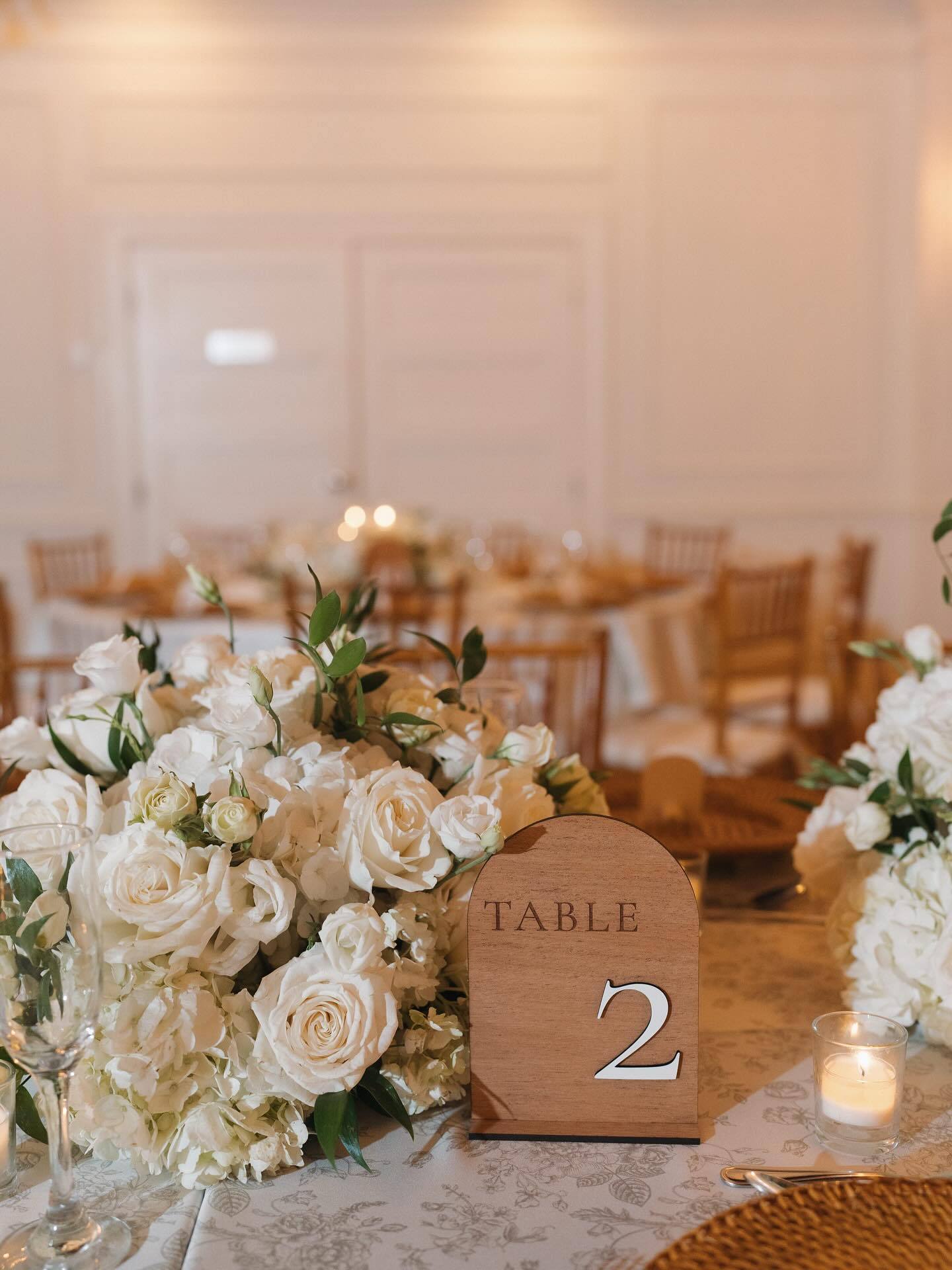 Personalized wooden table marker at a wedding
