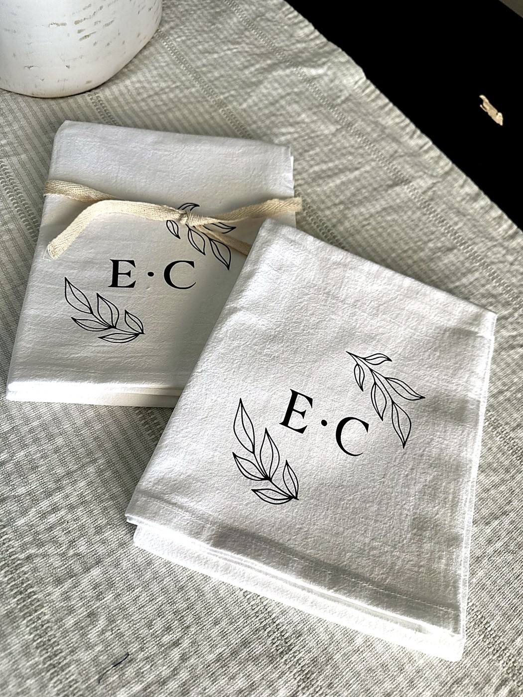 Personalized wedding kitchen towels with an E and C monogram