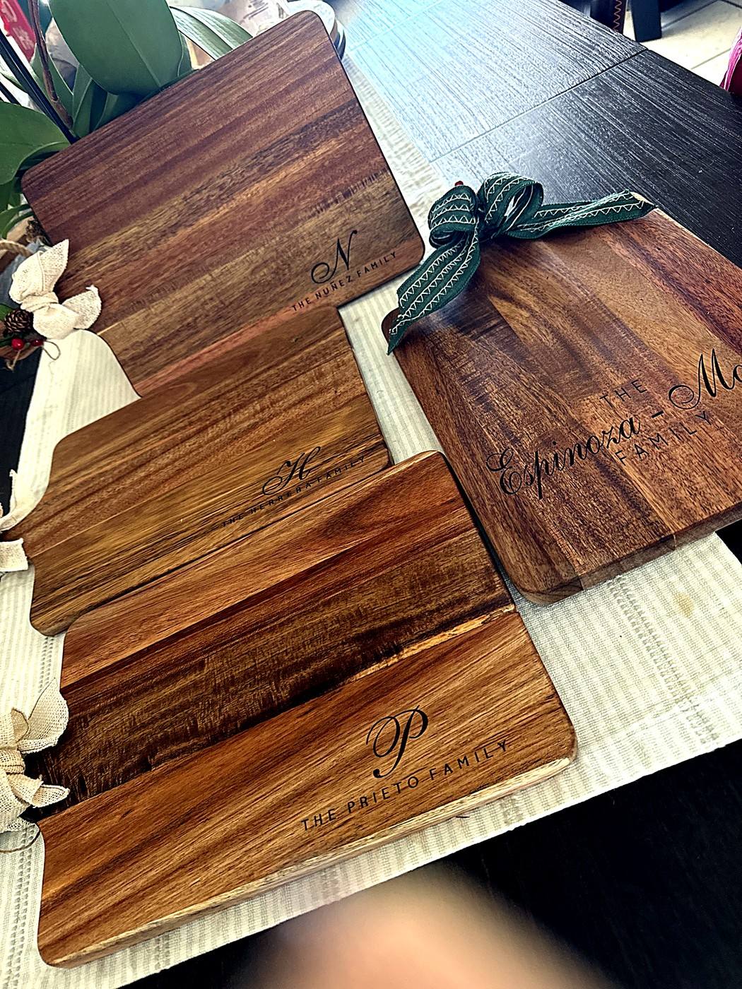 Family initial engraved boards — Nuñez, Herrera, Prieto and Espinoza