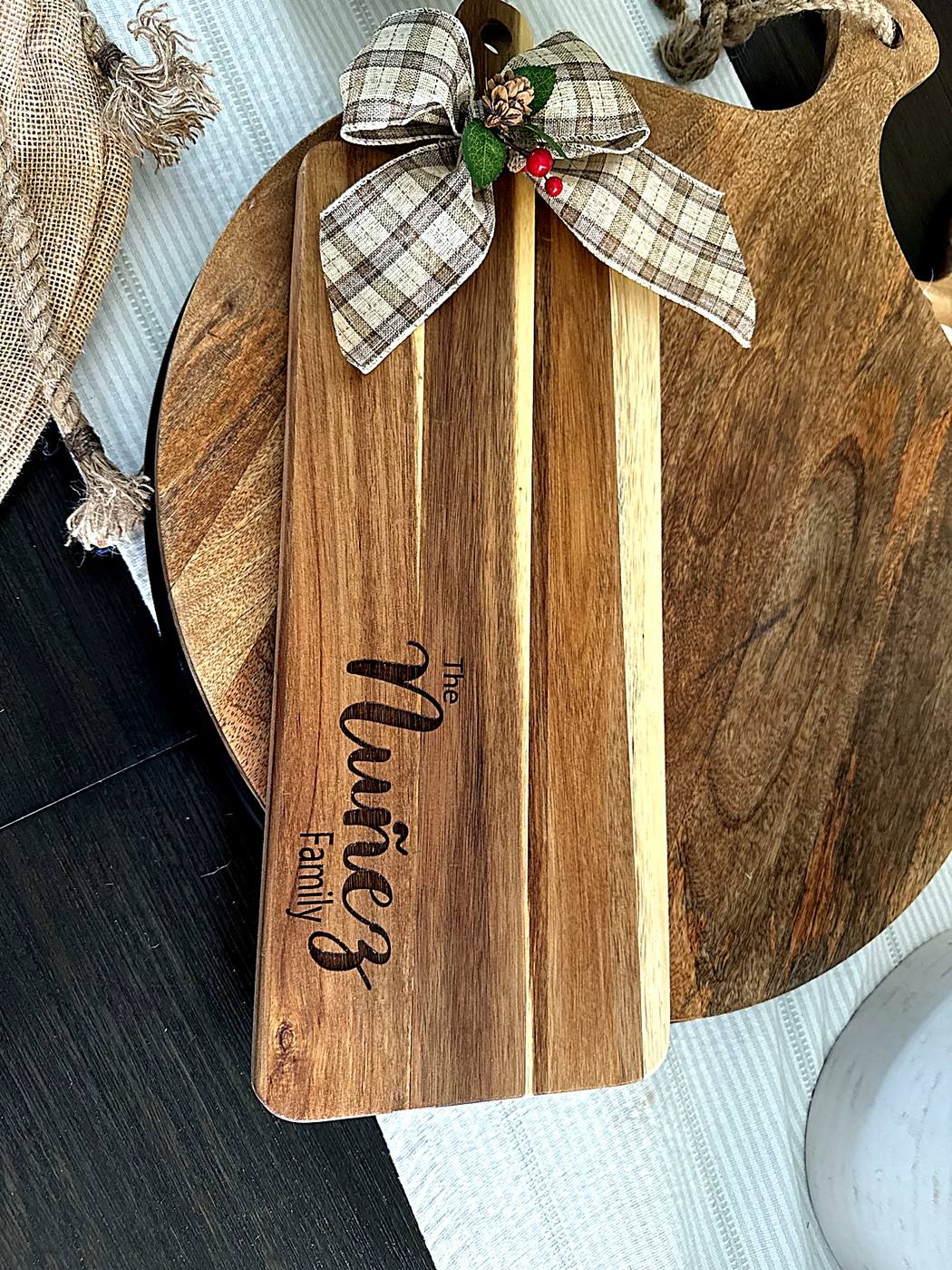 Engraved long board, The Muñoz Family